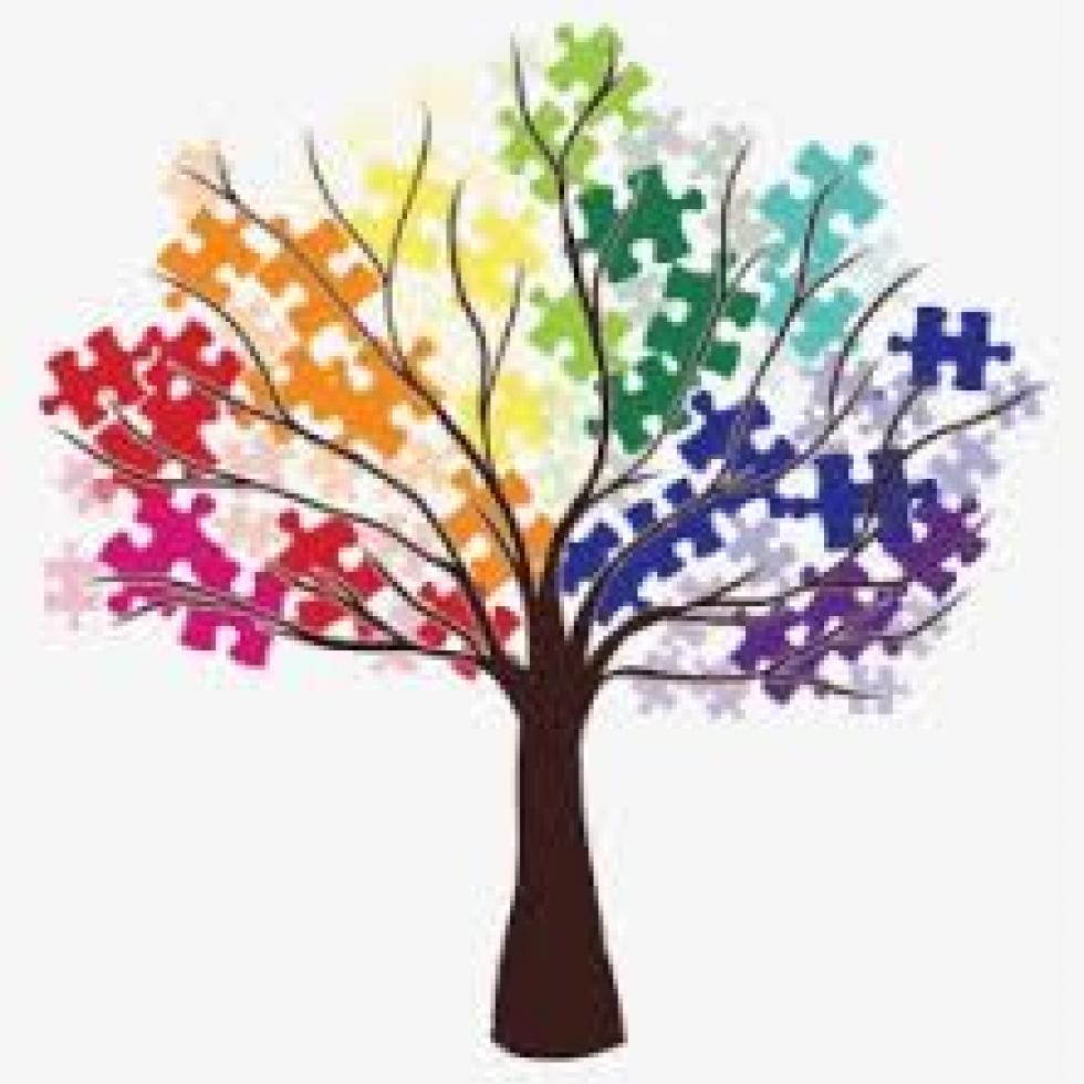 Autism Awareness image - tree with colorful puzzle pieces