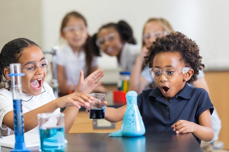 A group of girls conducting a science experiment