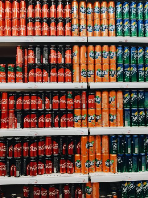 A Shelf of Soda (including Coca Cola, Fanta, and Sprite)