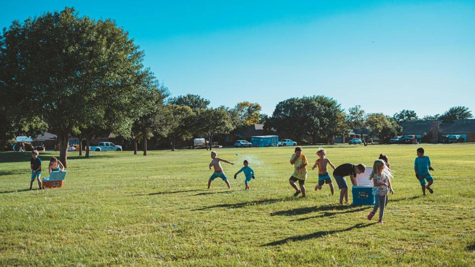 Photo by Anderson Schmig on Unsplash
Youth playing at a park in the sun