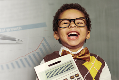 Boy with a calculator with a graph in the background.