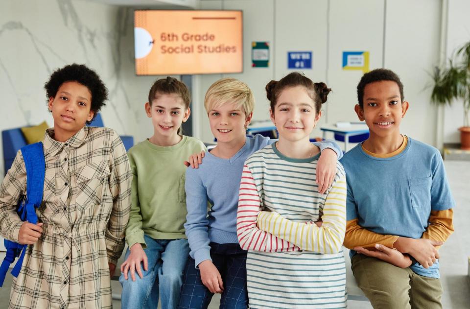 Photo of 5 children smiling