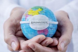 Hands holding a globe