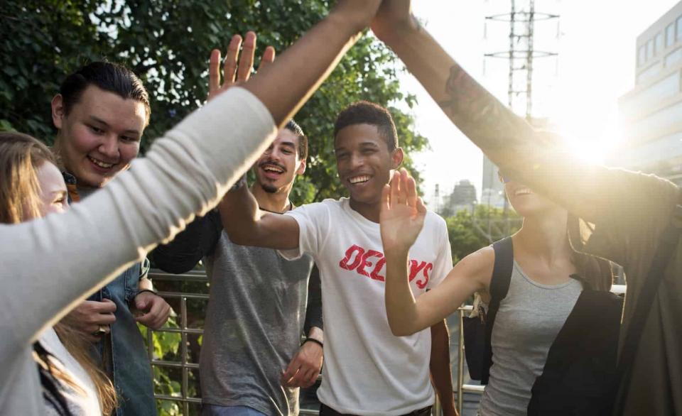 Group of People High-Fiving 