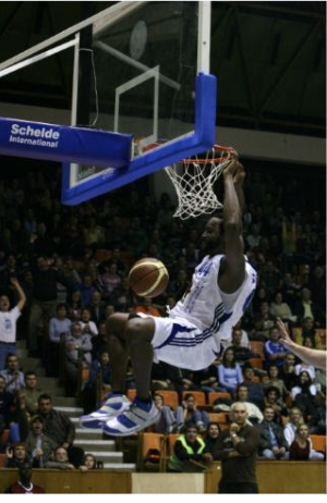 Troy playing basketball 