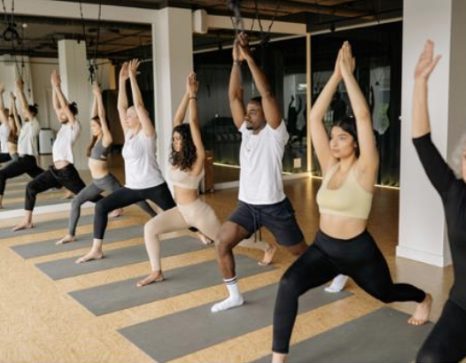 Photo of a group of people doing yoga