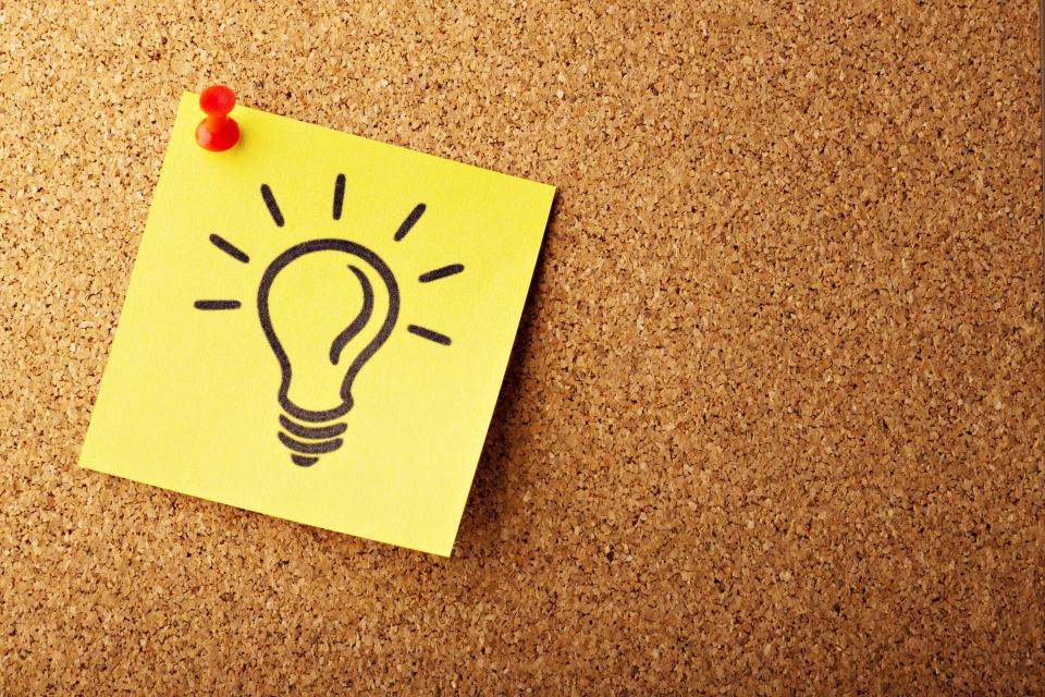 sketch of a light bulb on a board. 