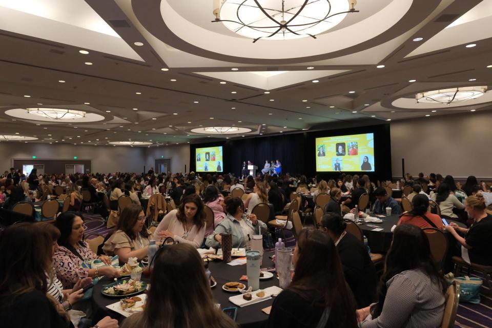 Panelists sitting on stage in a full ballroom at the 2026 Site Coordinator Symposium
