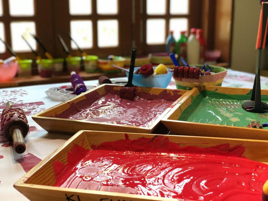 Containers holding paint