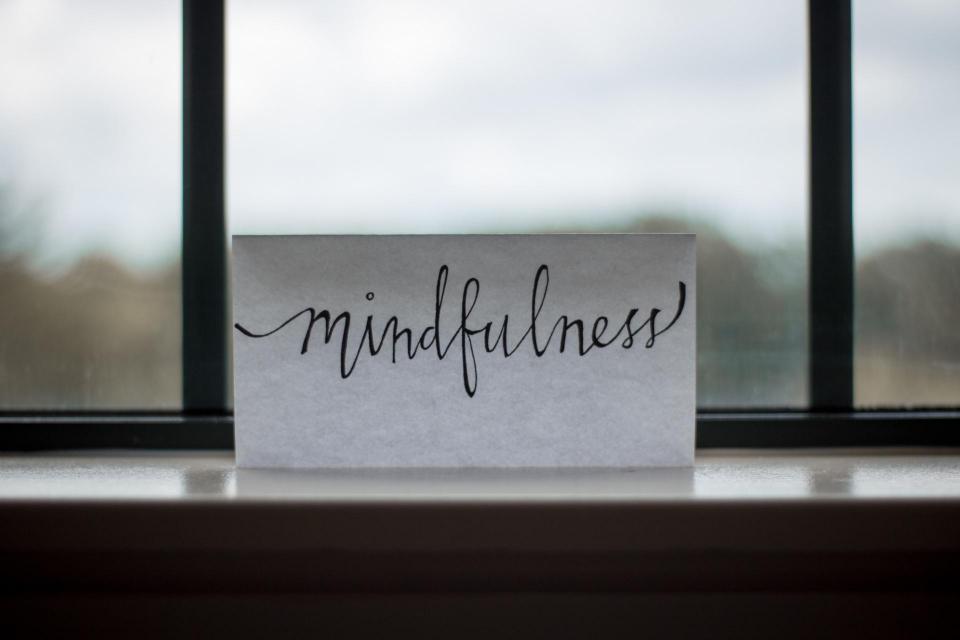 mindfulness on a paper in the window