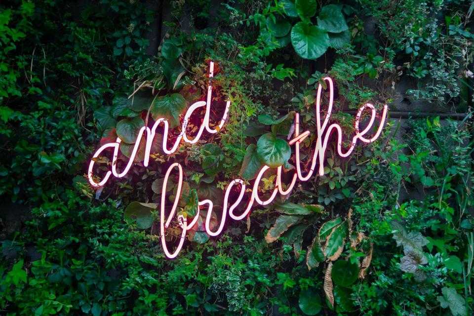"and breathe" sign