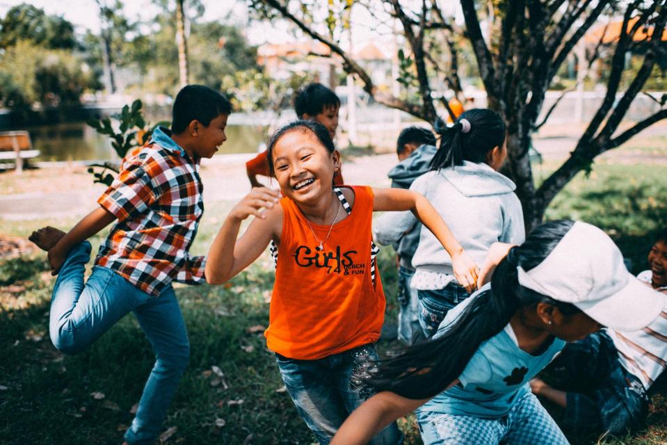 Students running around a Summer camp