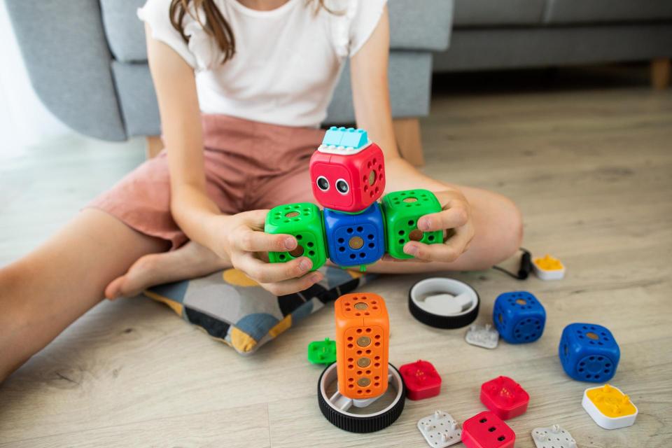 Child building with a robot