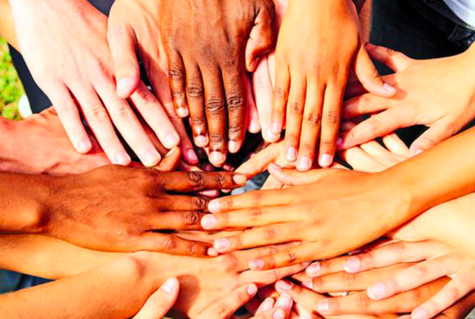 Children hands in a pile