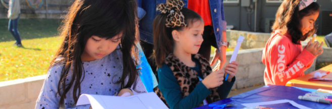 Students outside working on a project