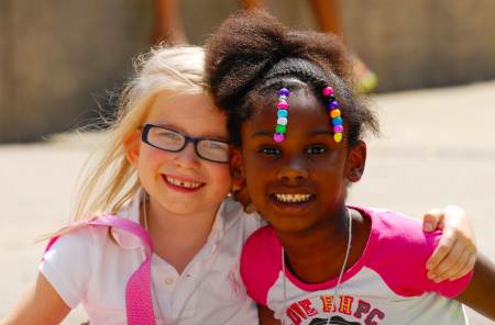 Two girls smiling