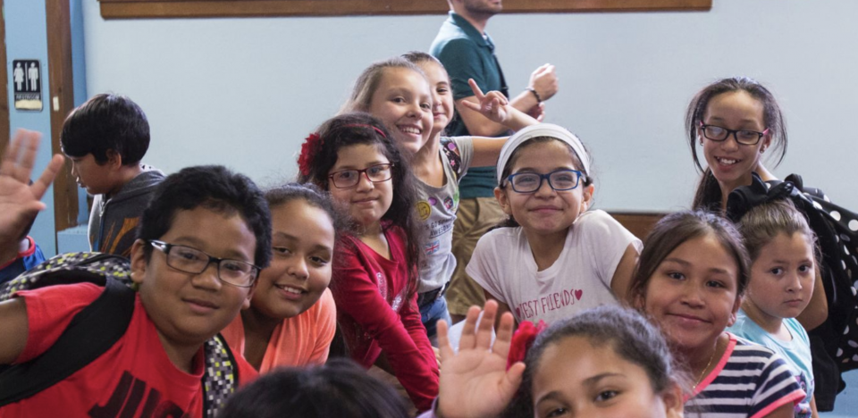 Photo of a group of children smiling