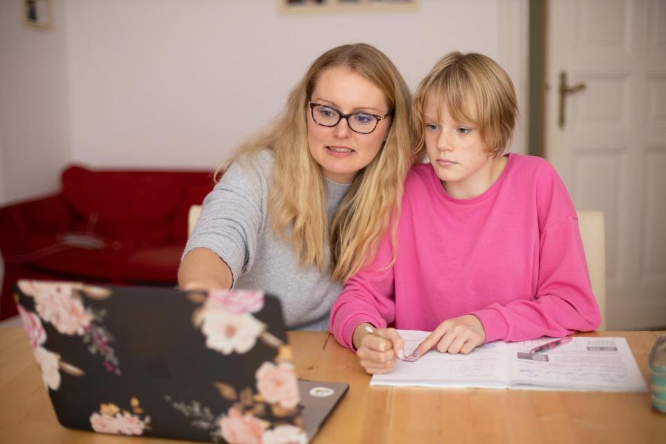 Adult tutoring child