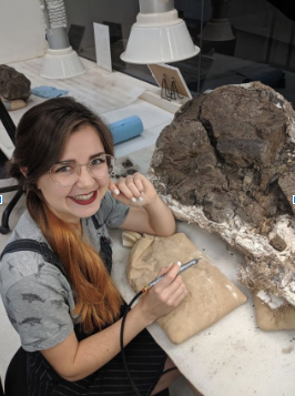 Myria Perez working on unearthing fossils